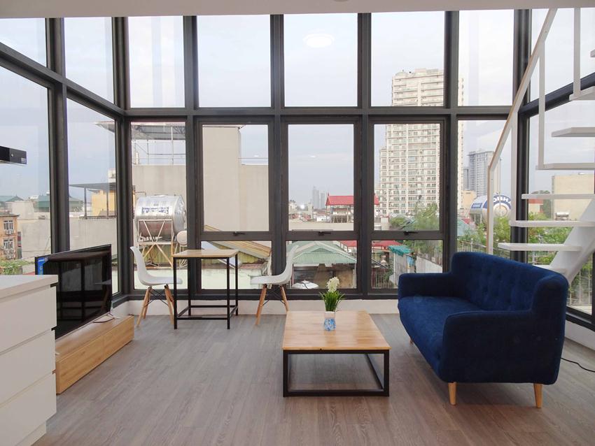 Unique rooftop duplex apartment with all glass wall